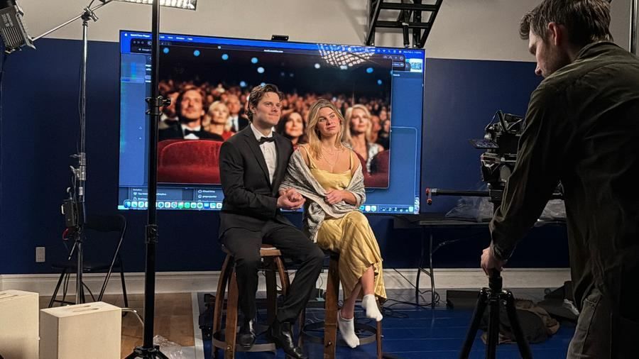 Reviewing the Frame: The production team reviews a take. The Bitcoin Rebellion, Sovereign Truth Media.